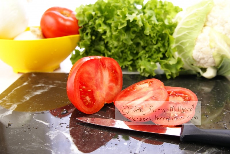 Stock Photo: Sliced Tomatoes - by Kathy Burns-Millyard