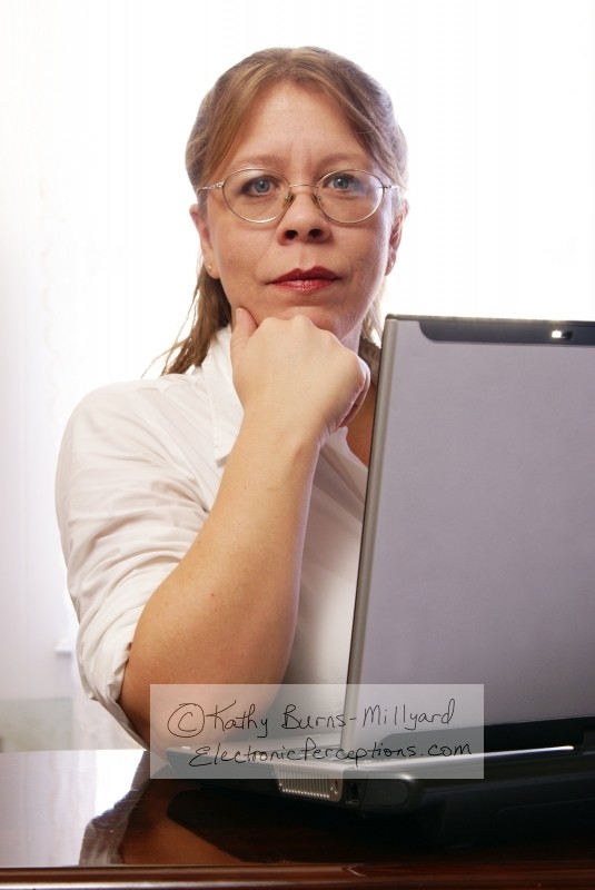 Stock Photo: Woman with Eyeglasses - by Kathy Burns-Millyard