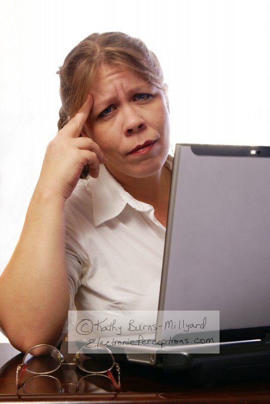 Stock Photo: Woman with Headache - by Kathy Burns-Millyard