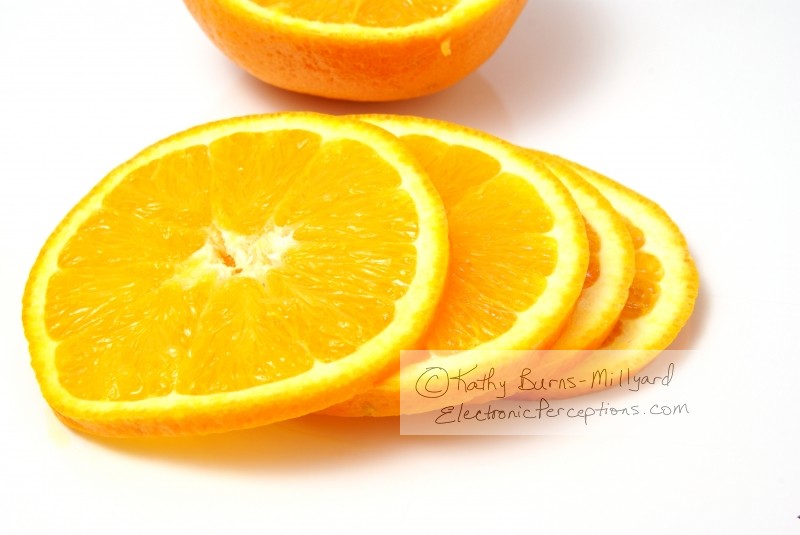 Stock Photo: Sliced Orange - by Kathy Burns-Millyard