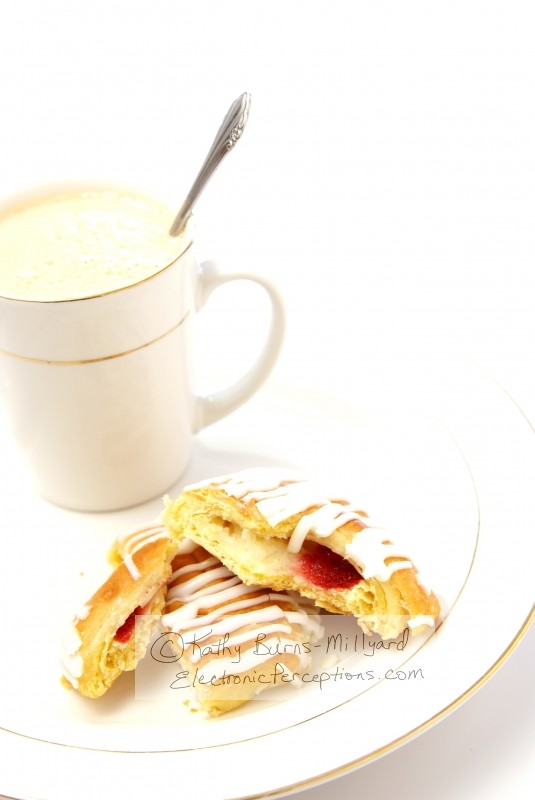 Stock Photo: Danish and cappuccino - by Kathy Burns-Millyard