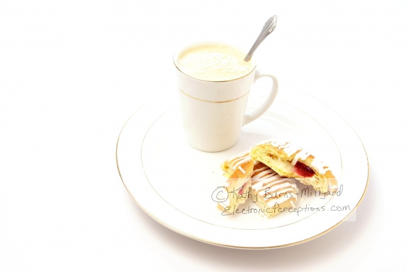 Stock Photo: Danish and cappuccino - by Kathy Burns-Millyard