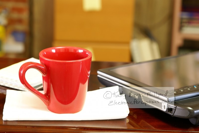 Stock Photo: Coffee Cup and Tablet PC - by Kathy Burns-Millyard