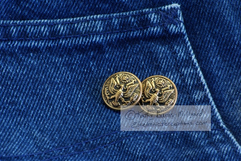 Stock Photo: Buttons on Denim - by Kathy Burns-Millyard