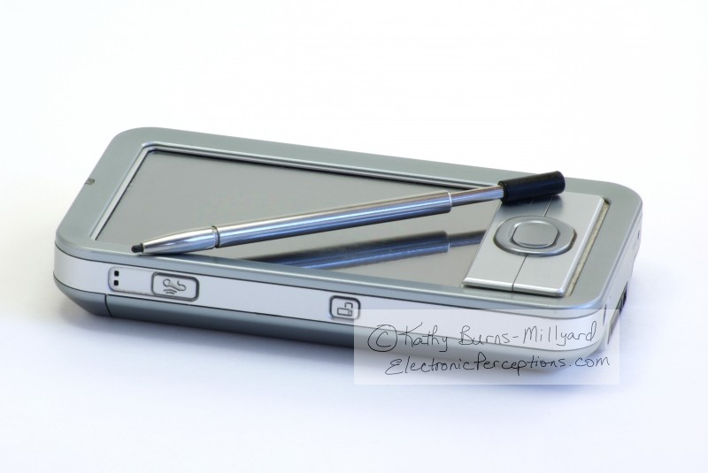 Stock Photo: Handheld PDA - by Kathy Burns-Millyard