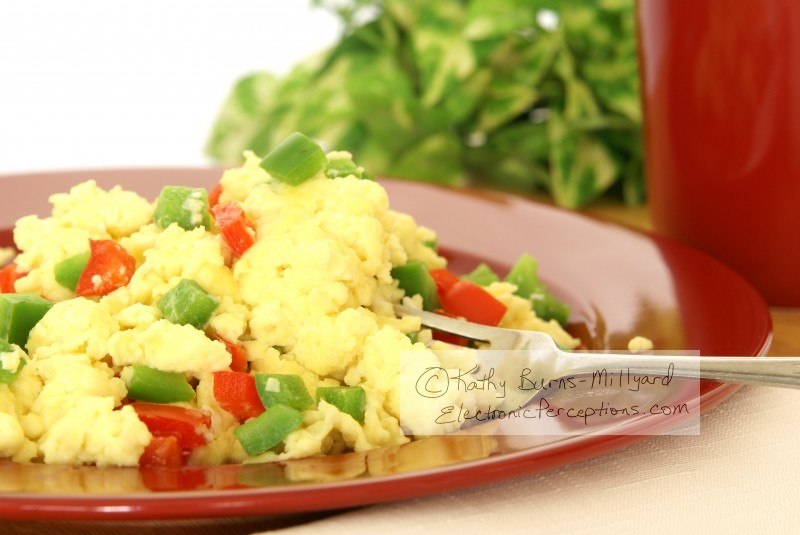 Stock Photo: Fluffy Scrambled Eggs Closeup - by Kathy Burns-Millyard