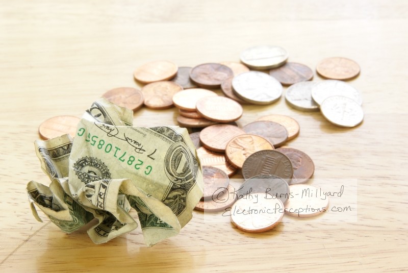 Stock Photo: Cash Crunch - by Kathy Burns-Millyard