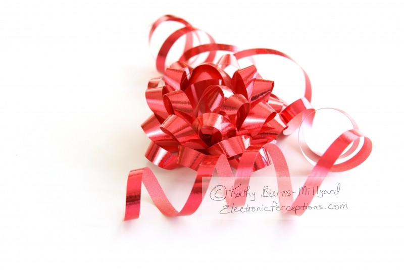 Stock Photo: Red Bow and Ribbon - by Kathy Burns-Millyard