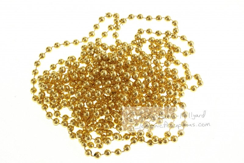 Stock Photo: Gold Beads - by Kathy Burns-Millyard