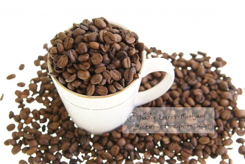 Stock Photo: Coffee Beans In Mug - by Kathy Burns-Millyard