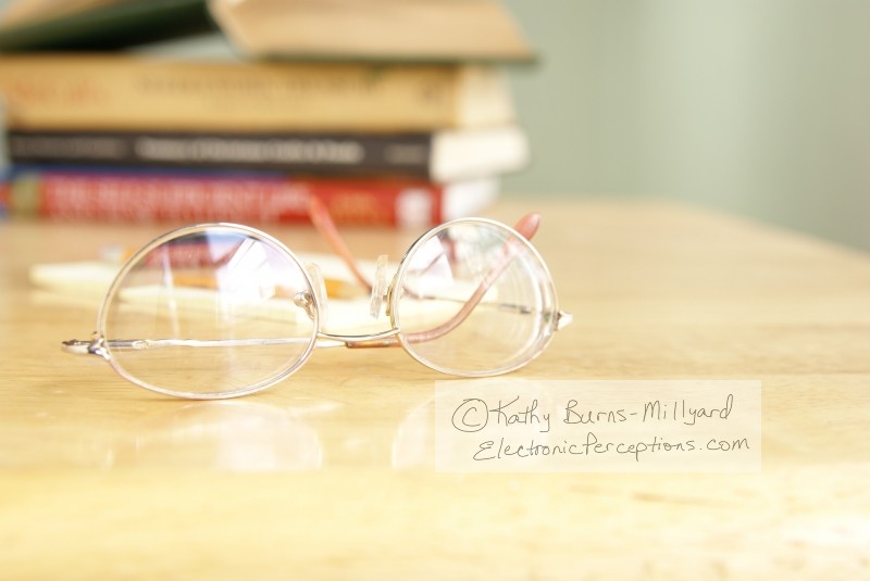 Stock Photo: Eyeglasses on Table - by Kathy Burns-Millyard