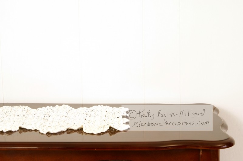 Stock Photo: Doily on Table - by Kathy Burns-Millyard