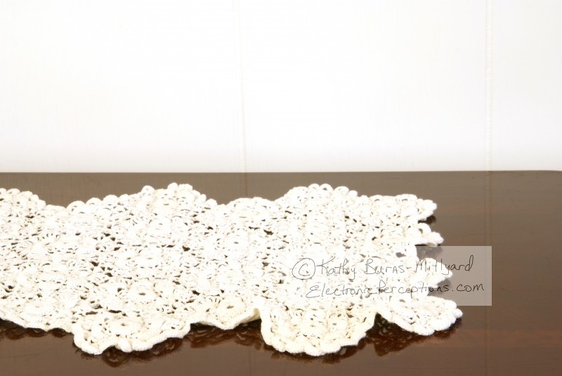 Stock Photo: Doily on Table - by Kathy Burns-Millyard