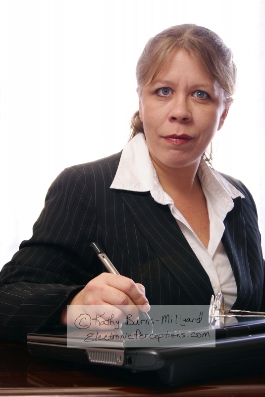 Female Business Executive With Tablet PC - Stock photography ©Kathy Burns-Millyard